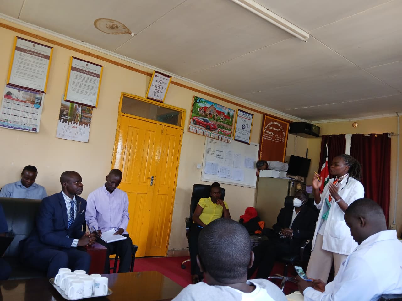Deborah presenting to institutional staff during a training session